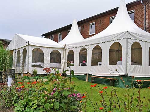 Party tent made of flame-retardant woven tarpaulin, event construction