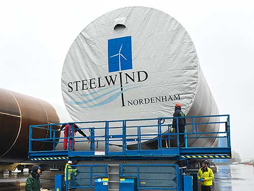 Woven tarpaulins to protect the monopile during transport and storage, wind energy plants on and offshore