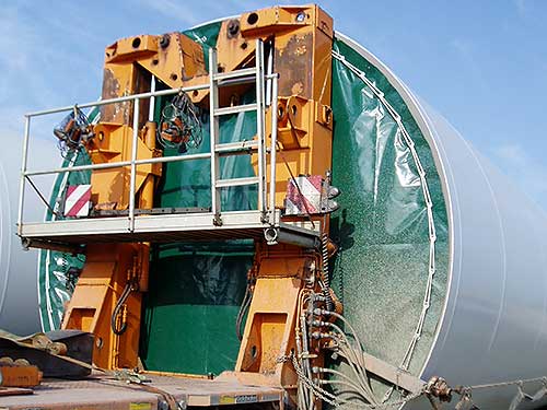Transport tarpaulin mounted on the tower segment, tower tarpaulins, woven tarpaulin, cover, wind energy sector, metal construction